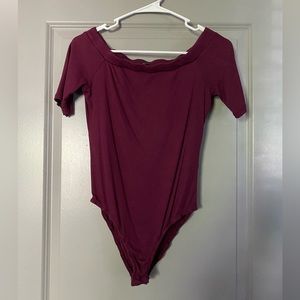 Short sleeved bodysuit size medium.